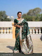 Soft Banarasi silk saree with zari weaving Meenakari touchup design all over the saree & Meenakari weawing Rich pallu with Meenakari weawing border & Tessell attached at Pallu End.