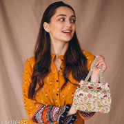 Royal finishing touch to your ethnic look with this luxury traditional purse