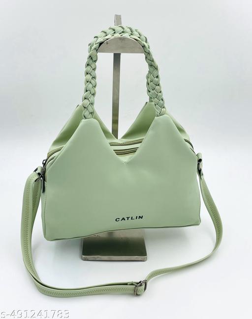 Knitted Hand Held Handbag with adjustable Sling