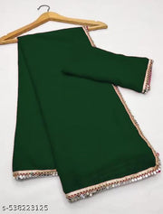 women's stylish green color plain pure fox georgette  fabrics saree with very attractive mirror lace in saree for wedding event party to very comfortable and very fashionable .