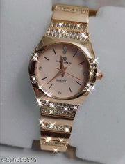 S K Enterprise Elegant gold-tone women's wristwatch with sparkling rhinestone embellishments and a quartz movement.