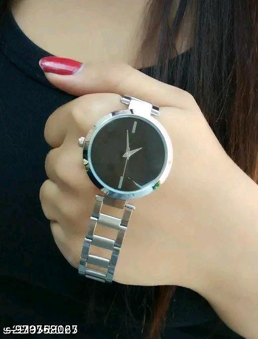 High Demaned with black round roamn nuremalDial and Silver metal cahin watch for women