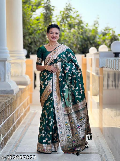 Soft Banarasi silk saree with zari weaving Meenakari touchup design all over the saree & Meenakari weawing Rich pallu with Meenakari weawing border & Tessell attached at Pallu End.