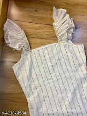 woman heavy chikankari kurti