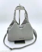 Knitted Hand Held Handbag with adjustable Sling