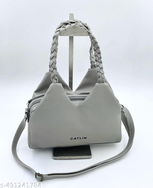 Knitted Hand Held Handbag with adjustable Sling