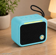 Wireless Mini Bluetooth Speaker with Deep Bass, Dynamic HD Sound, 1200mAh Long Battery Backup, RGB Light Bar, Compact Portable Design, Easy Bluetooth Pairing for Smartphones | Multicolour