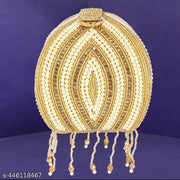 REAL LIFE STUNNING FABULOUS AND DELUXE FESTIVE/PARTY/WEDDING/BRIDAL POTLI FOR WOMEN