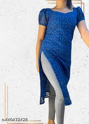 woman heavy chikankari kurti