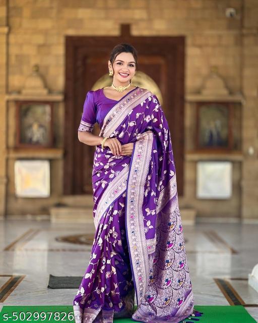 Soft Banarasi silk saree with zari weaving Meenakari touchup design all over the saree & Meenakari weawing Rich pallu with Meenakari weawing border & Tessell attached at Pallu End.