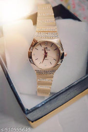 S K Enterprise Elegant gold-tone women's wristwatch with sparkling rhinestone embellishments and a quartz movement.