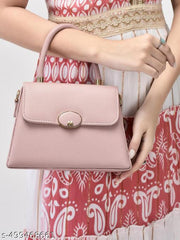 Designer Handbag for women with gold accents and detachable strap