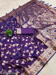 Soft Banarasi silk saree with zari weaving Meenakari touchup design all over the saree & Meenakari weawing Rich pallu with Meenakari weawing border & Tessell attached at Pallu End.