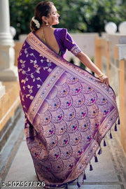 Soft Banarasi silk saree with zari weaving Meenakari touchup design all over the saree & Meenakari weawing Rich pallu with Meenakari weawing border & Tessell attached at Pallu End.