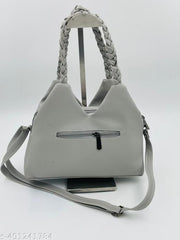 Knitted Hand Held Handbag with adjustable Sling