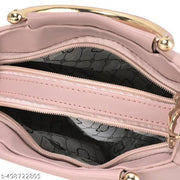 Designer Handbag with gold accents and detachable strap
