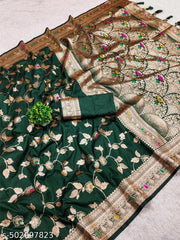 Soft Banarasi silk saree with zari weaving Meenakari touchup design all over the saree & Meenakari weawing Rich pallu with Meenakari weawing border & Tessell attached at Pallu End.