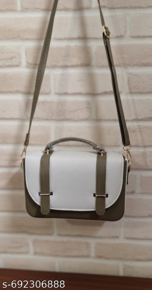 structured top-handle satchel featuring a two-tone color-block design Luvoksi Green & White Sling Bag Treio. KLEIO Green & White Solid Medium Satchel Handbag and the Sydney Spark Green Hand-held Bag.