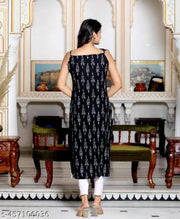 Sleeveless A-line kurti . black colour with lace attractive kurti design