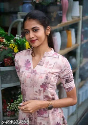 “Women’s Stylish Pink Floral Printed Kurti with V-Neck & Half Sleeves”