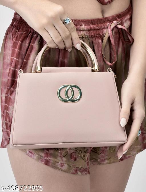 Designer Handbag with gold accents and detachable strap