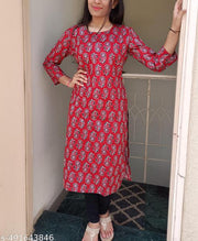 Vibrant and Striking Rust Color Kurti with Intricate White and Black Printed Patterns for a Stylish Contemporary Look