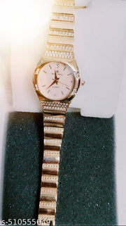 S K Enterprise Elegant gold-tone women's wristwatch with sparkling rhinestone embellishments and a quartz movement.