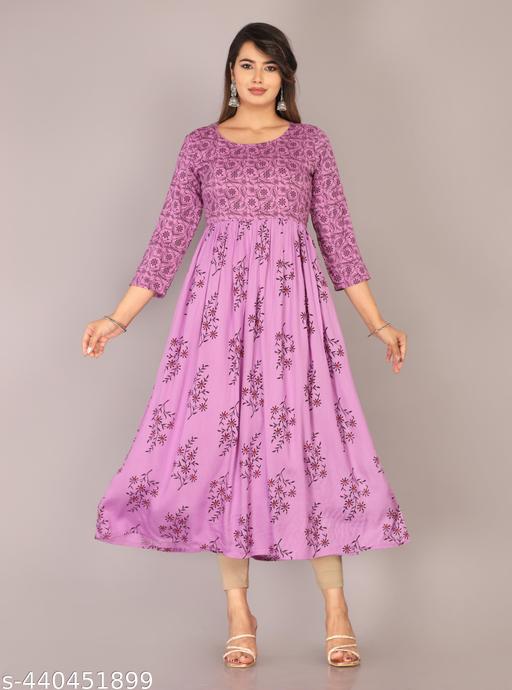 "Unleash Your Inner Fashionista: Our Rayon Kurti Features a Stunning Array of Pigment Prints in Every Color You Desire!"