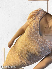 woman heavy chikankari kurti