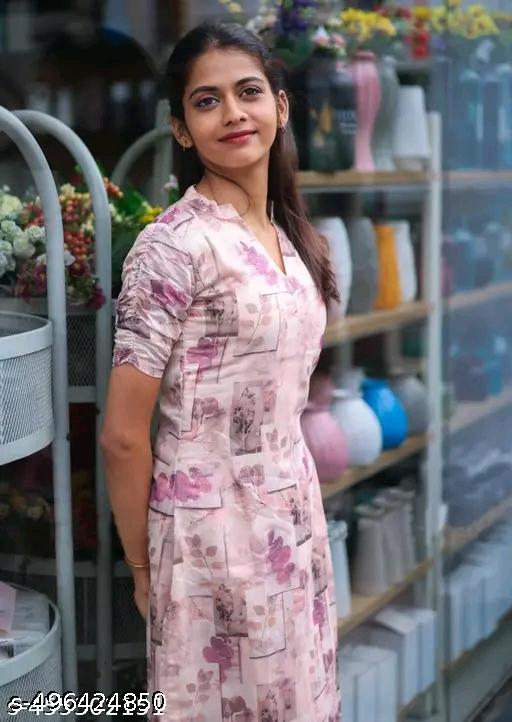 “Women’s Stylish Pink Floral Printed Kurti with V-Neck & Half Sleeves”