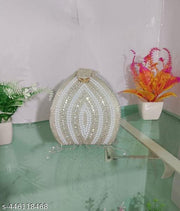 REAL LIFE STUNNING FABULOUS AND DELUXE FESTIVE/PARTY/WEDDING/BRIDAL POTLI FOR WOMEN